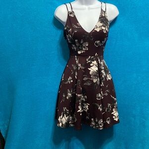 Very pretty dark burgundy dress.